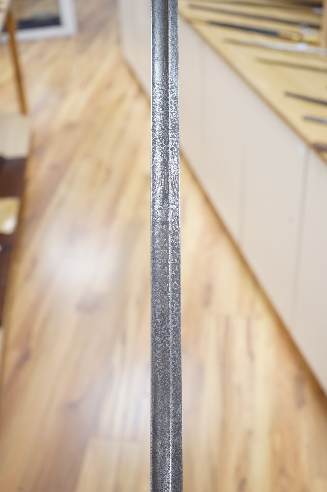 A Victorian 1845 pattern infantry officer’s levee sword, with slender blade etched; Hamburger Rogers & Co., and crowned VR and foliage, regulation pierced brass guard with folding side guard, wire bound fish skin covered
